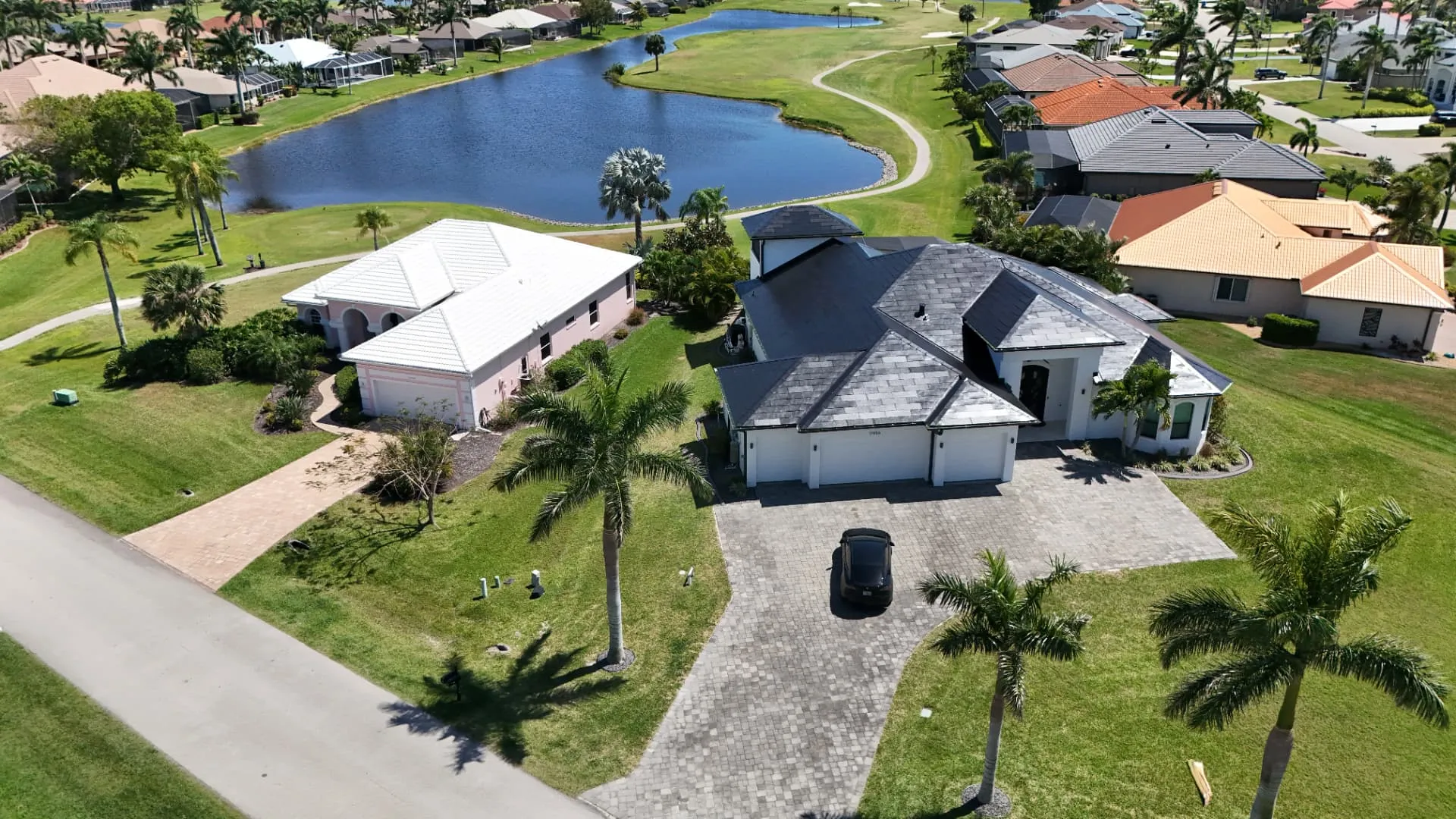 Aerial view of a new roof on a golf course home in Punta Gorda