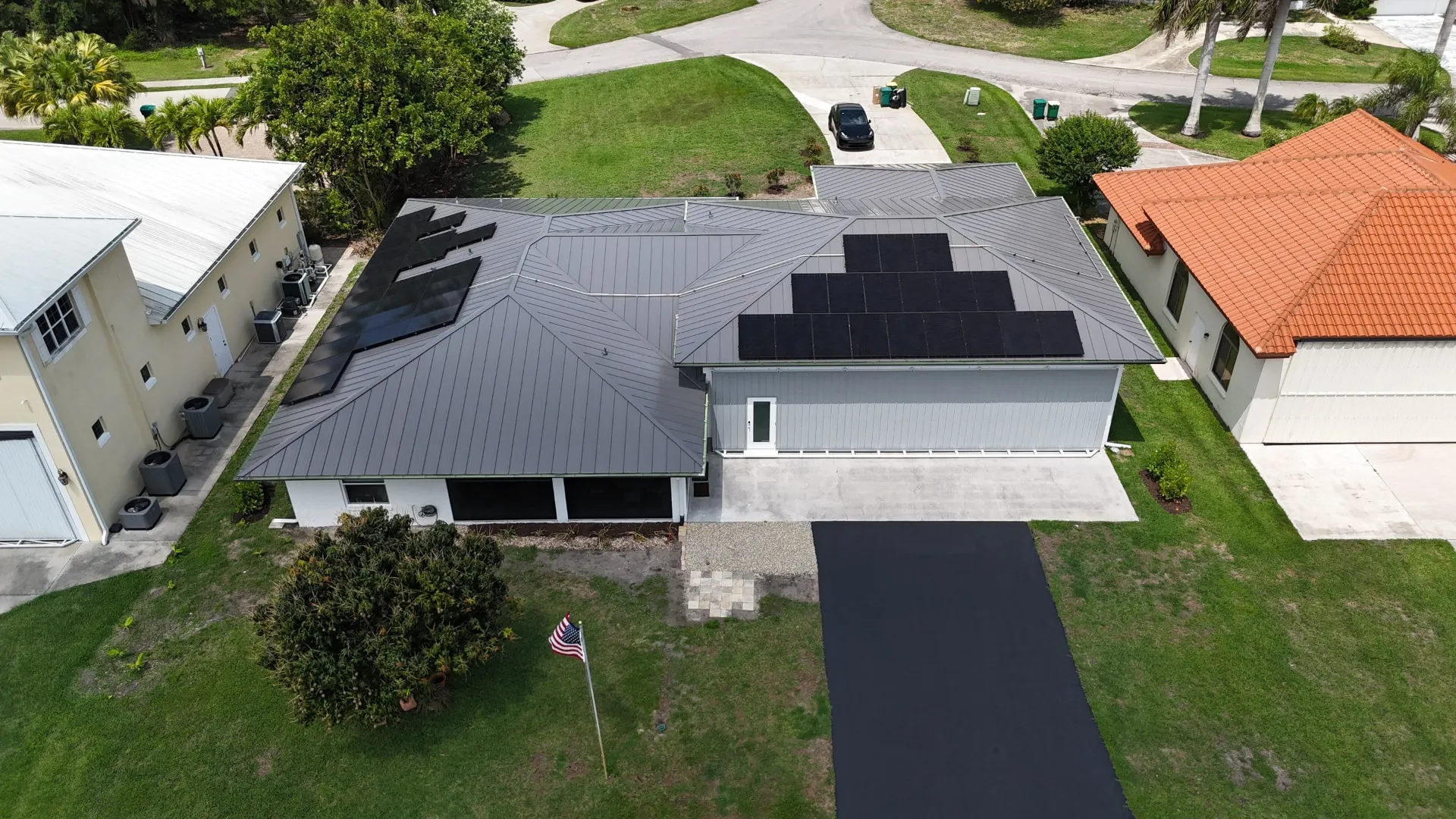Aerial of a metal roof solar install on a Florida home