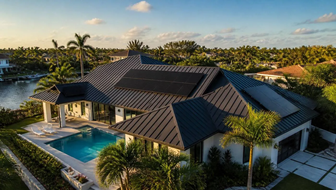 Metal roof replacement with solar panels on a Florida home by Coastal Energy