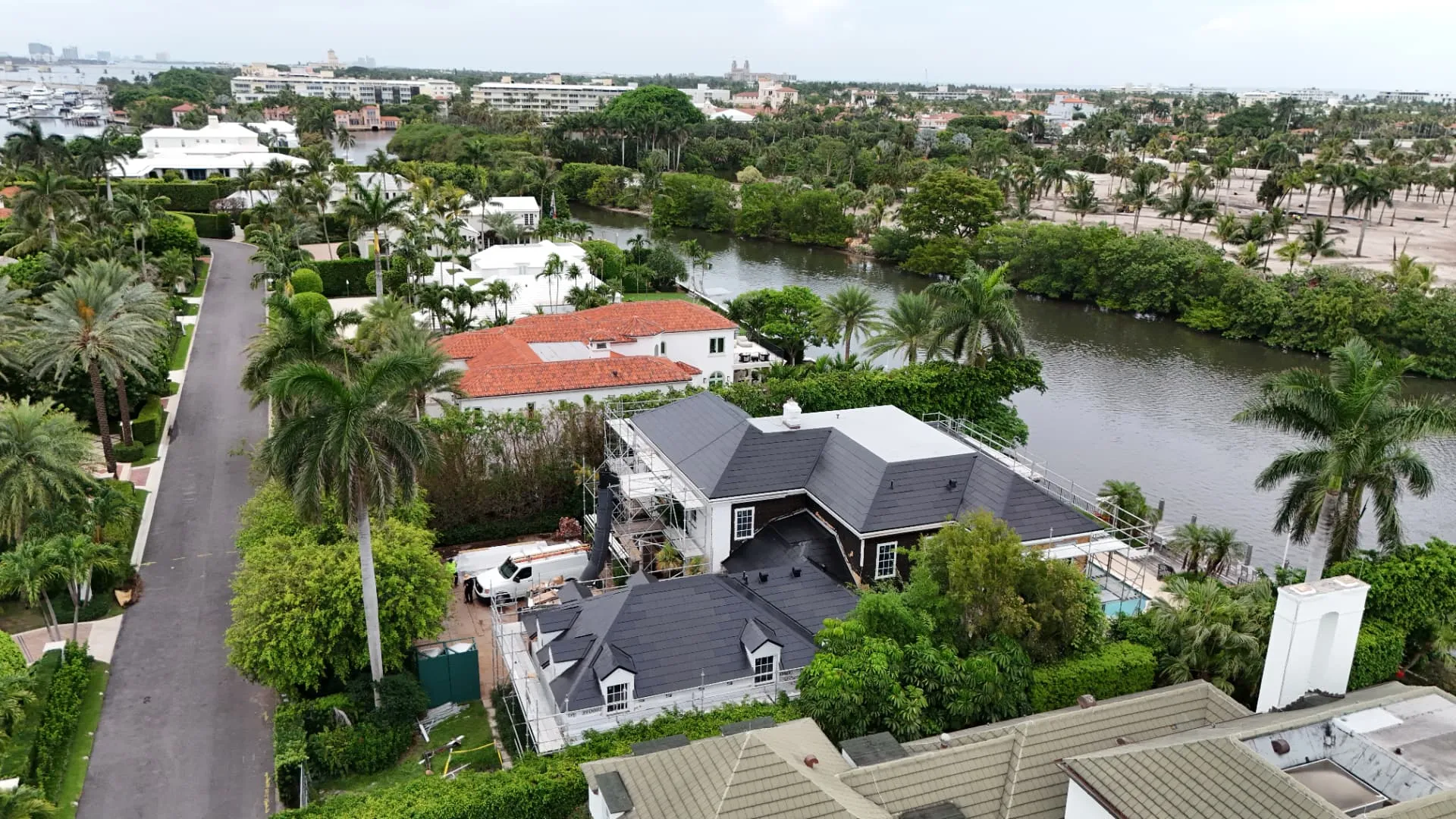 Aerial view of a Palm Beach estate roof replacement by Coastal Energy