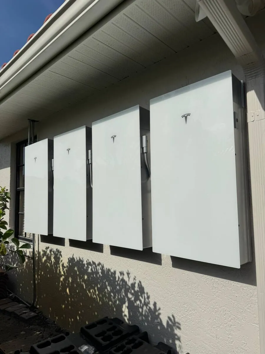 Bank of Tesla Powerwall 3 home batteries installed by Coastal Energy in Florida
