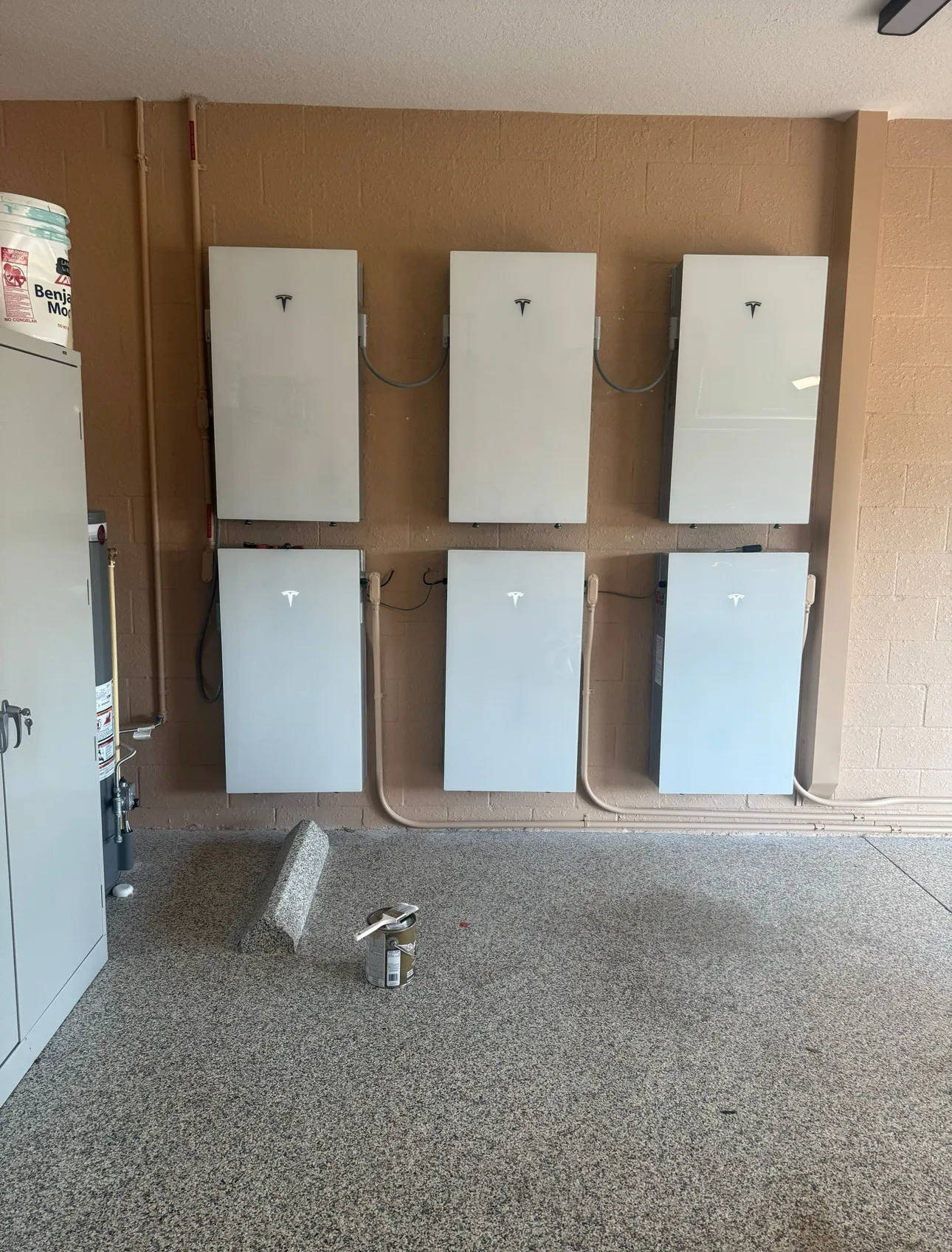 Six Tesla Powerwall batteries installed in a Southwest Florida garage