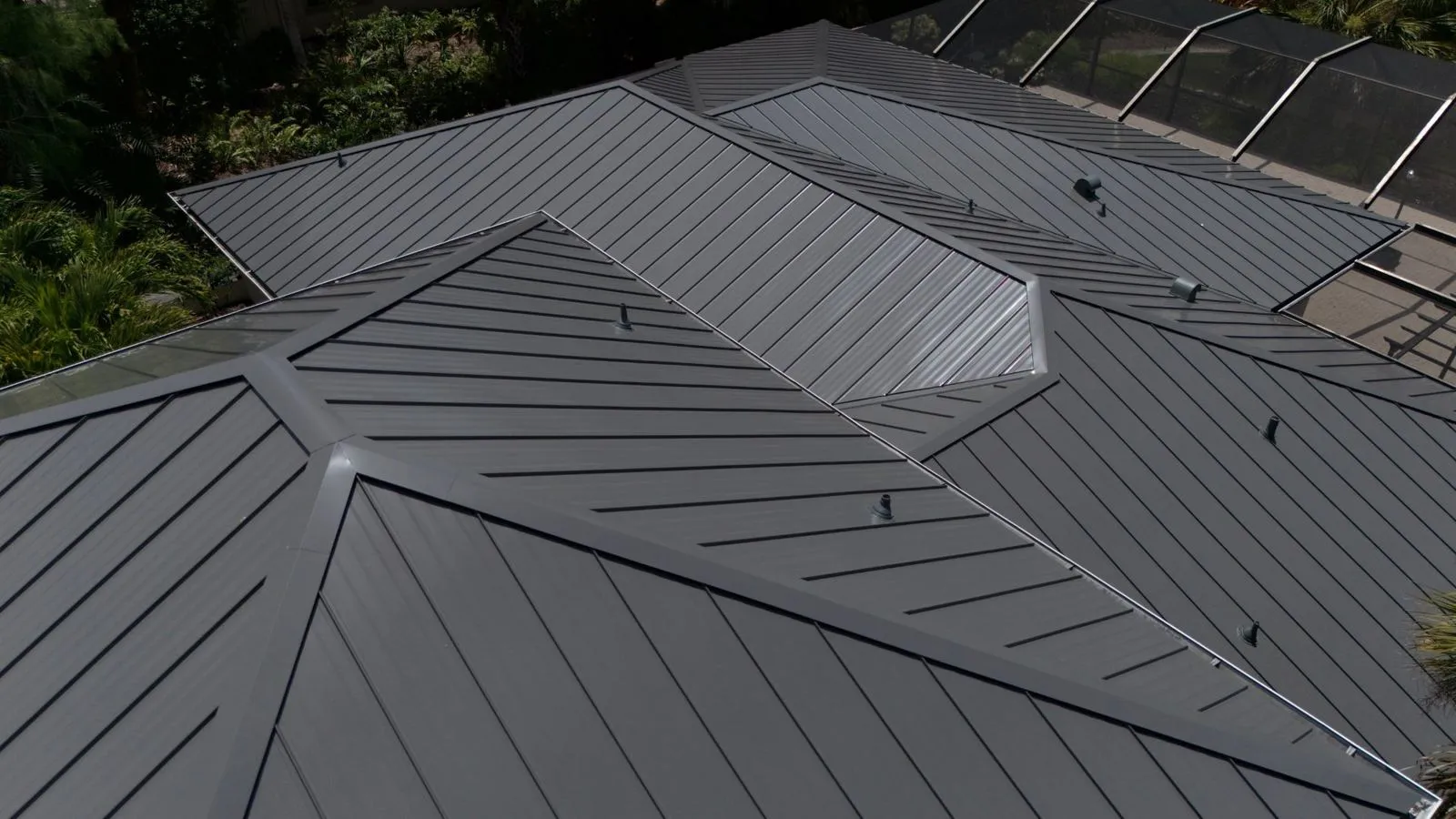 Metal roof replacement with solar panels on a Florida home by Coastal Energy